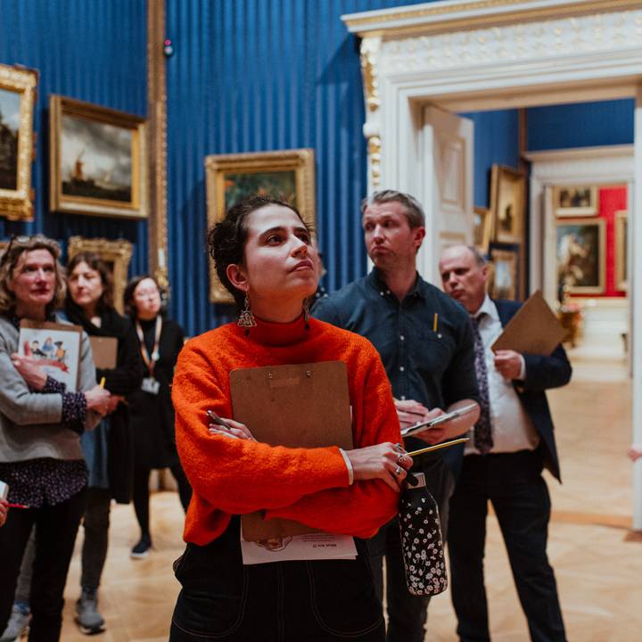 man smiling in gallery